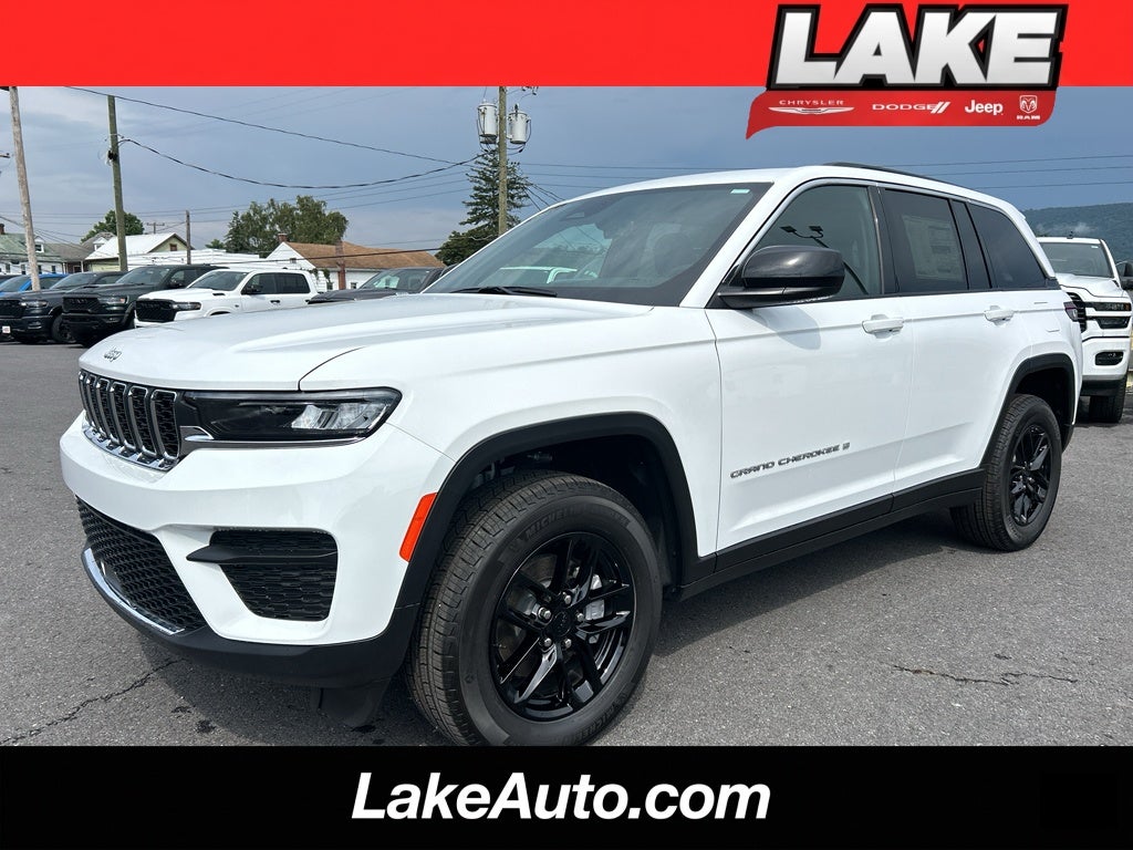 2026 Jeep Grand Cherokee Laredo in Bright White Clear-Coat Exterior Paint — front three-quarter view