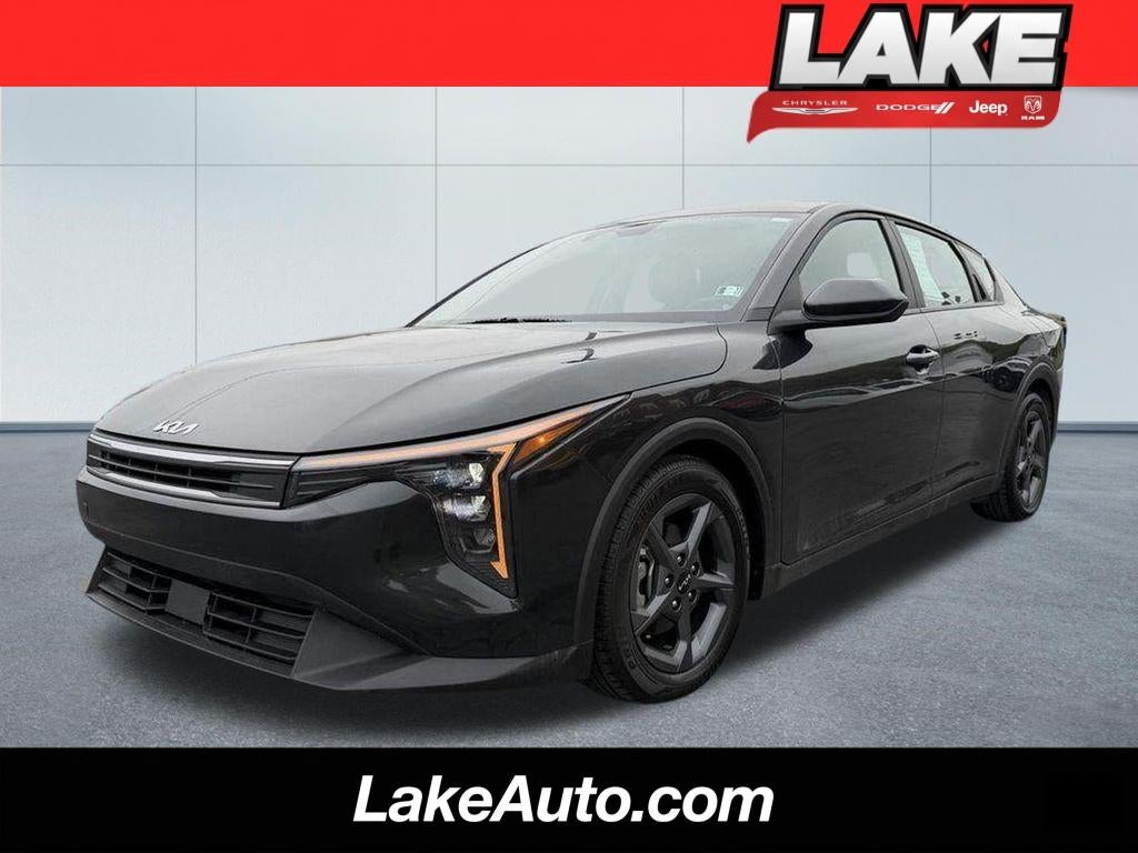 2025 Kia K4 LXS in Interstellar Gray — front three-quarter view