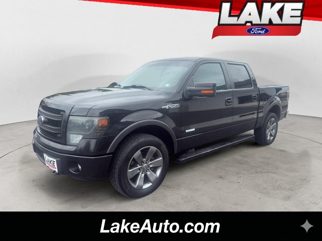 2014 Ford F-150 Limited in Tuxedo Black Metallic — front three-quarter view